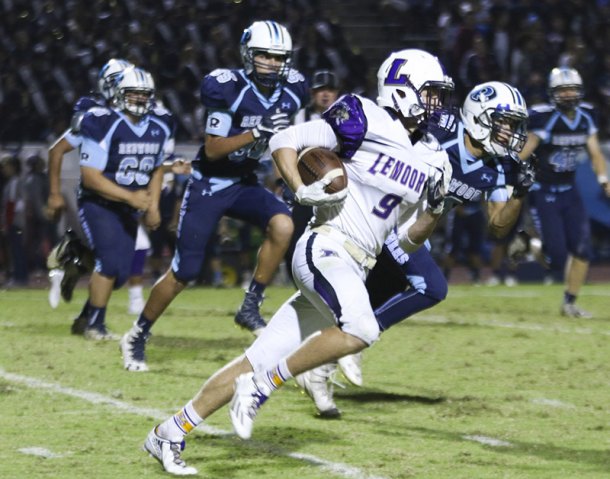 Jack Foote scored four times in Friday night's 37-21 win over Hanford West. He's shown here in last week's game against Redwood High School.